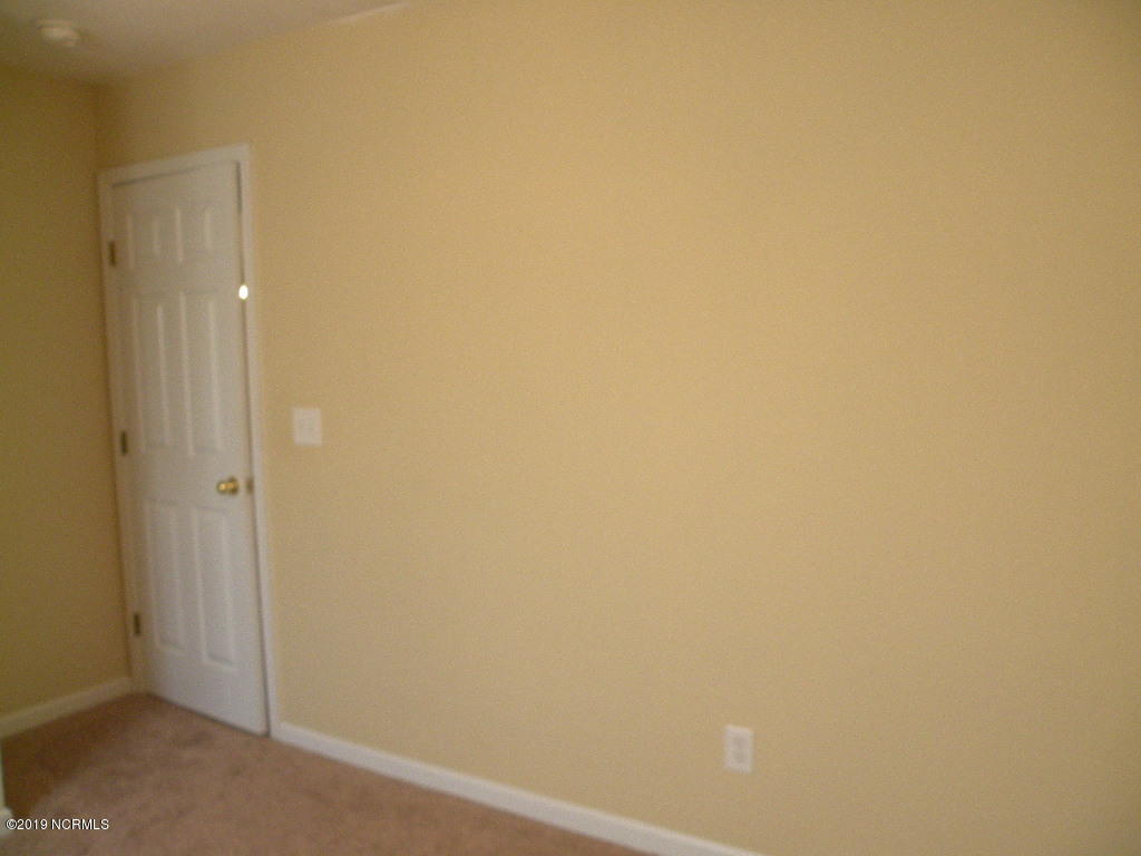 152 Oakley Drive New Bern, NC 28560 - Photo 12 of 40 Front room door
