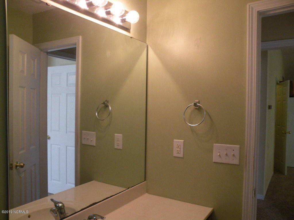 152 Oakley Drive New Bern, NC 28560 - Photo 16 of 40 Guest bath mirror