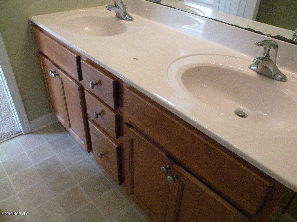 152 Oakley Drive New Bern, NC 28560 - Photo 25 of 40 master bath cabinets