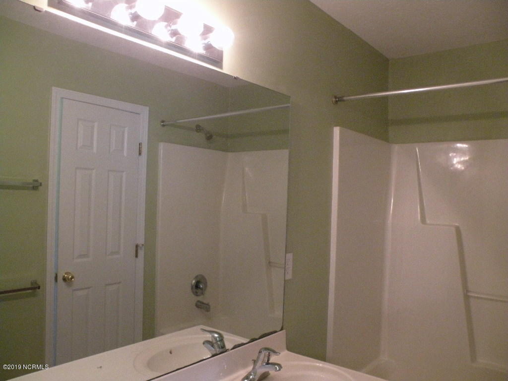 152 Oakley Drive New Bern, NC 28560 - Photo 26 of 40 master bath mirror