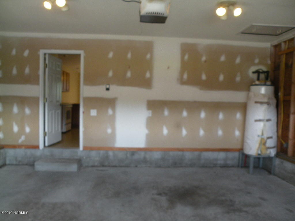 152 Oakley Drive New Bern, NC 28560 - Photo 39 of 40 unfinished garage