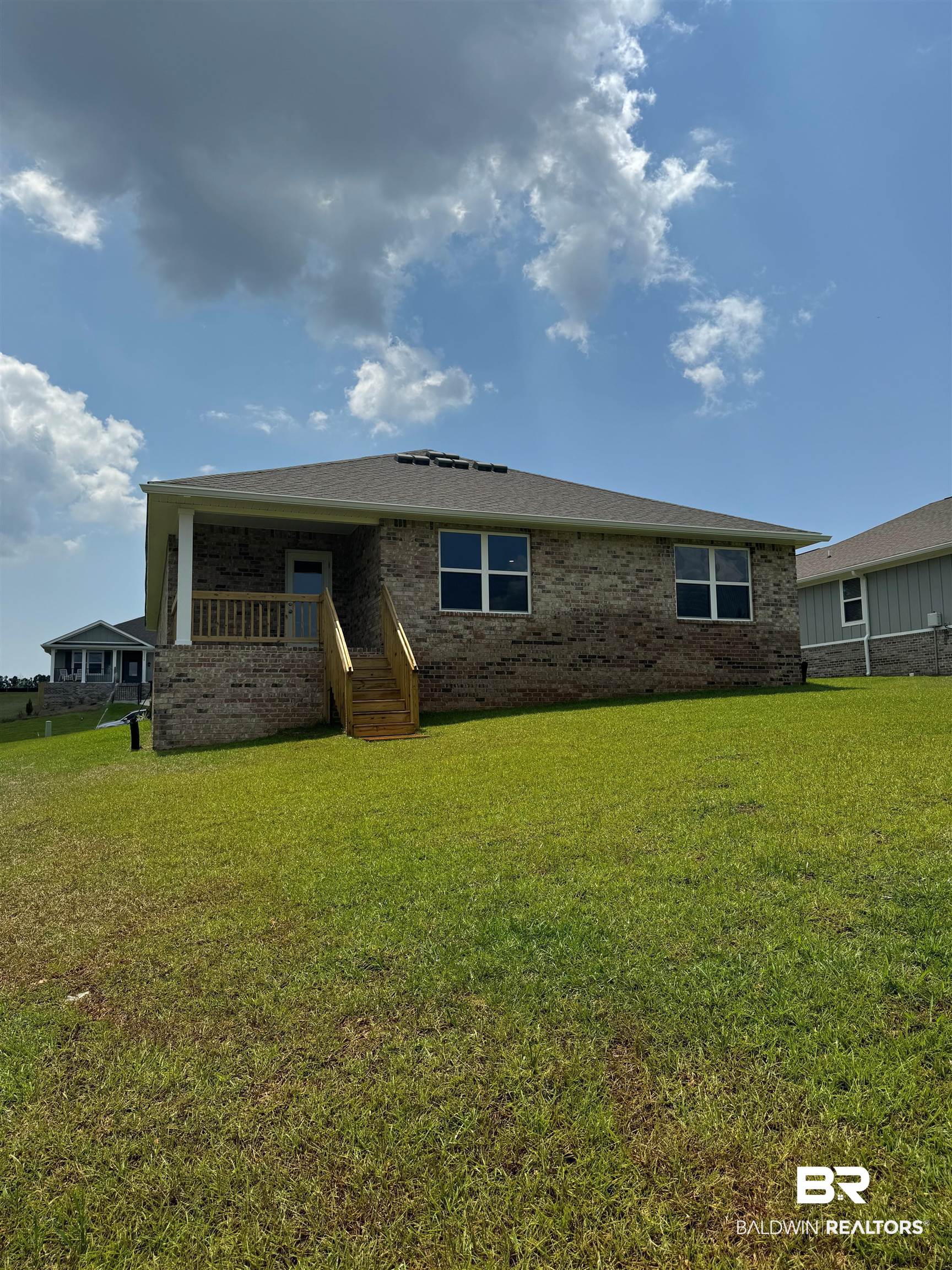 11335 Elemis Drive Daphne, AL 36526 - Photo 3 of 11 Exterior space with a lawn