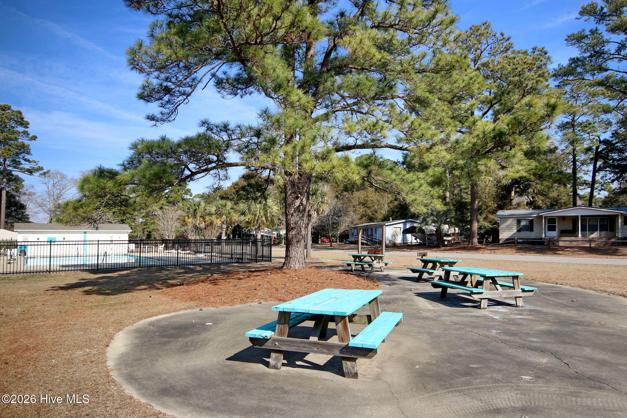 9157 Riveredge Place Southwest Calabash, NC 28467 - Photo 24 of 34 Picnic tables for community gatherings