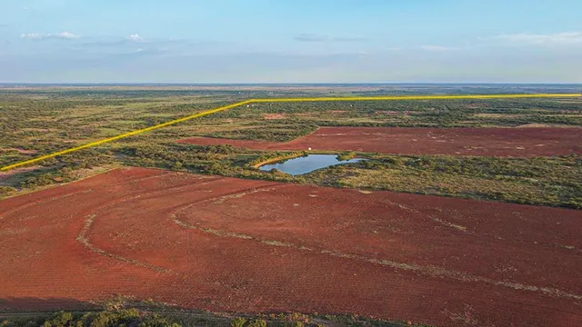a view of an ocean with a city