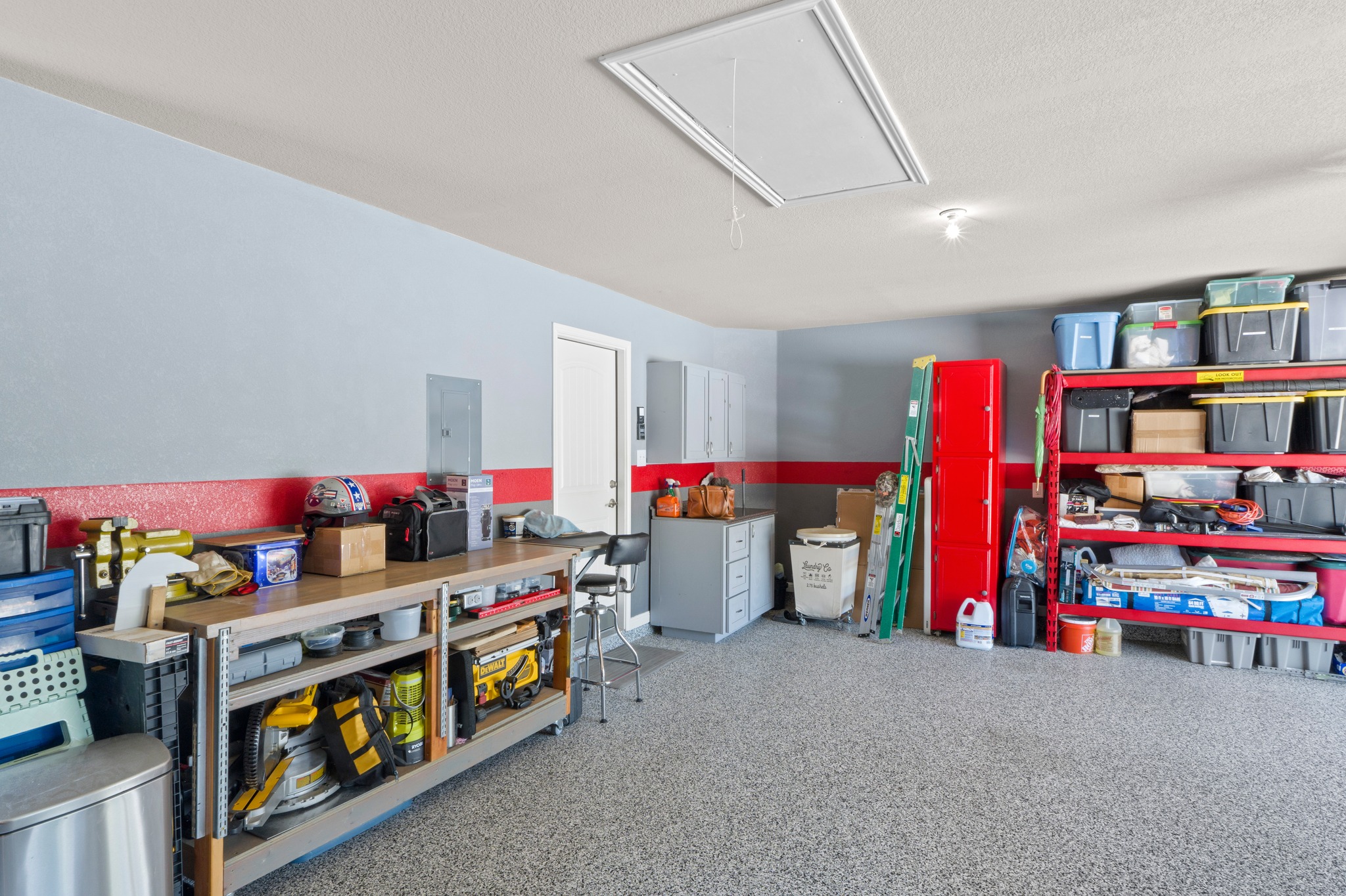 20525 Jackies Ranch Boulevard Pflugerville, TX 78660 - Photo 22 of 27 Remote control insulated doors on this custom finished garage