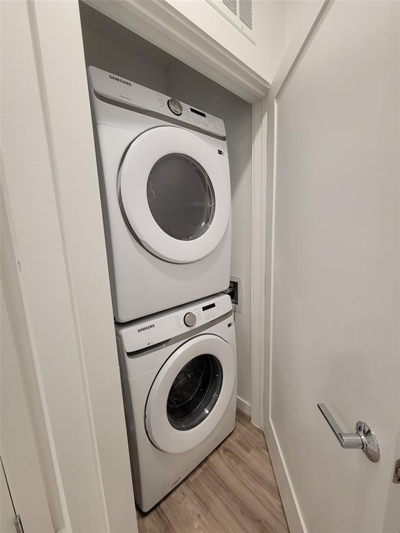 4801 Springdale Road, Unit 2211 Austin, TX 78723 - Photo 15 of 19 A dedicated laundry closet offers convenient stacked appliances.