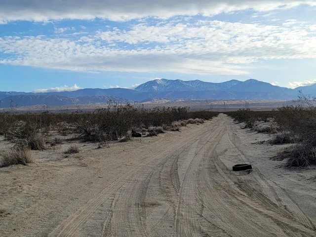a view of an outdoor space and mountain view