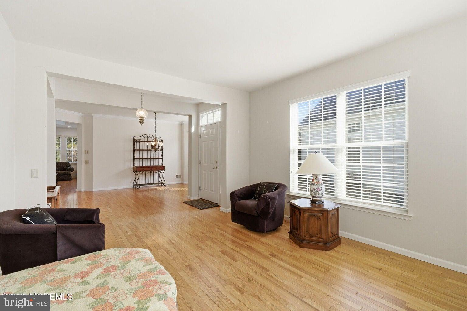 11 Ripple Terrace Barnegat, NJ 08005 - Photo 11 of 64 a living room with furniture windows and wooden floor