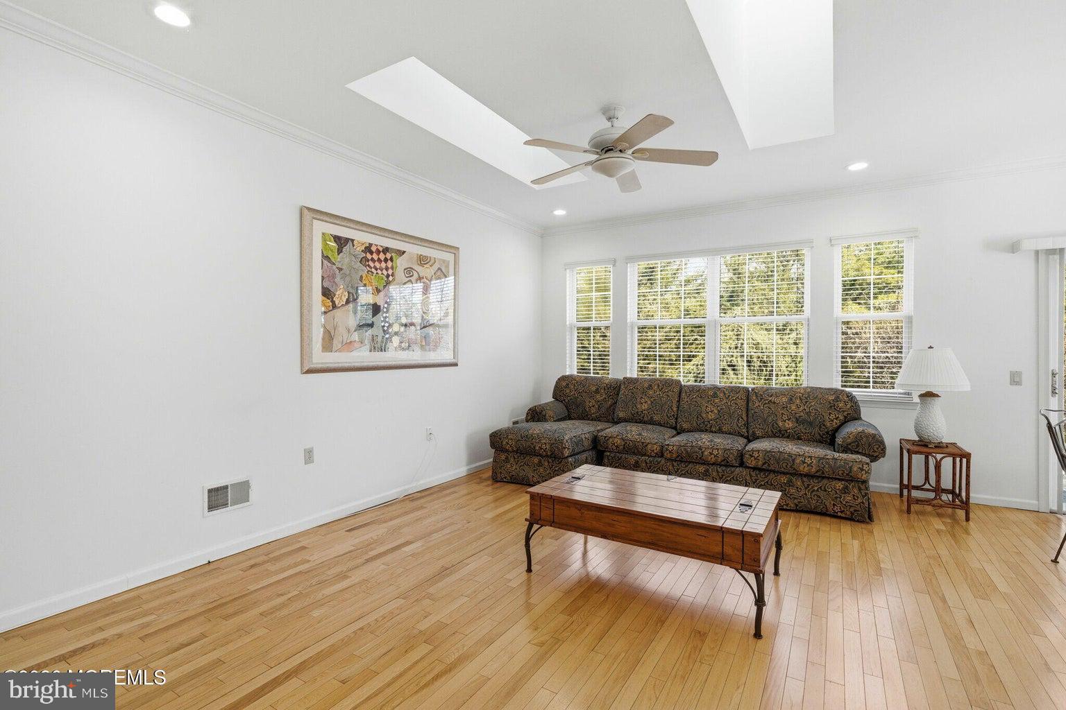 11 Ripple Terrace Barnegat, NJ 08005 - Photo 12 of 64 a living room with furniture and a large window