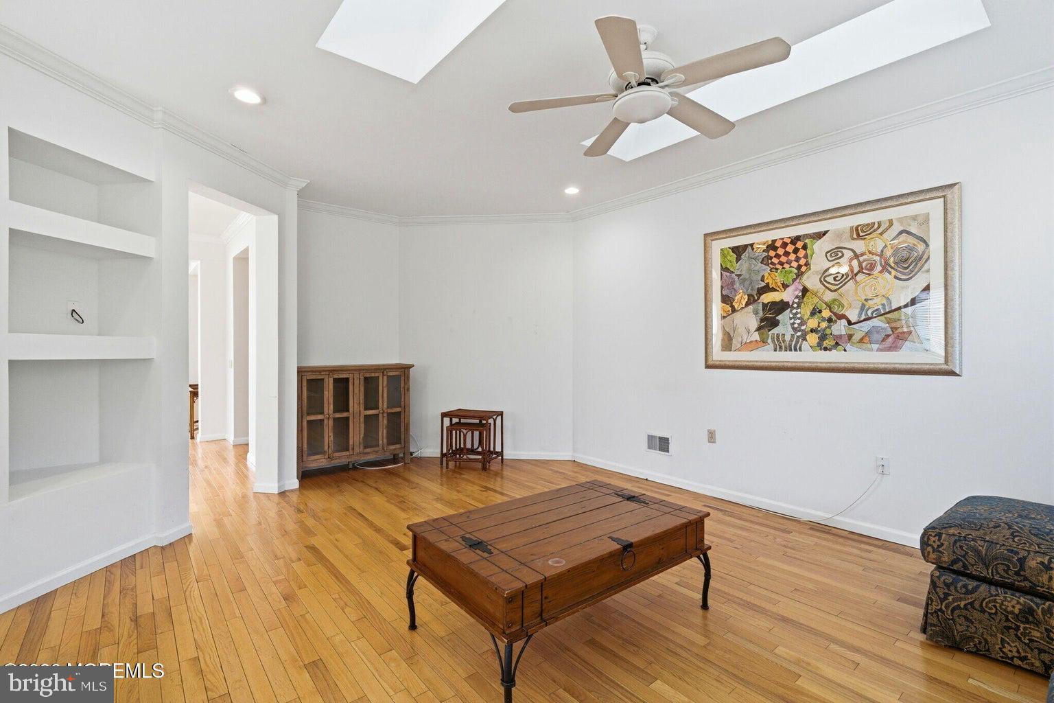 11 Ripple Terrace Barnegat, NJ 08005 - Photo 13 of 64 a living room with furniture and a fireplace