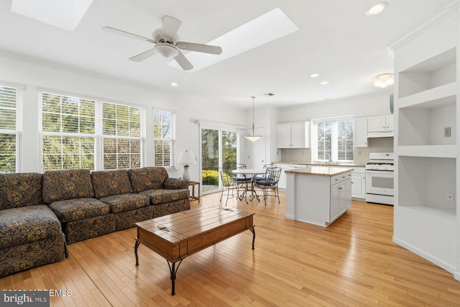 11 Ripple Terrace Barnegat, NJ 08005 - Photo 14 of 64 a living room filled with furniture and kitchen view