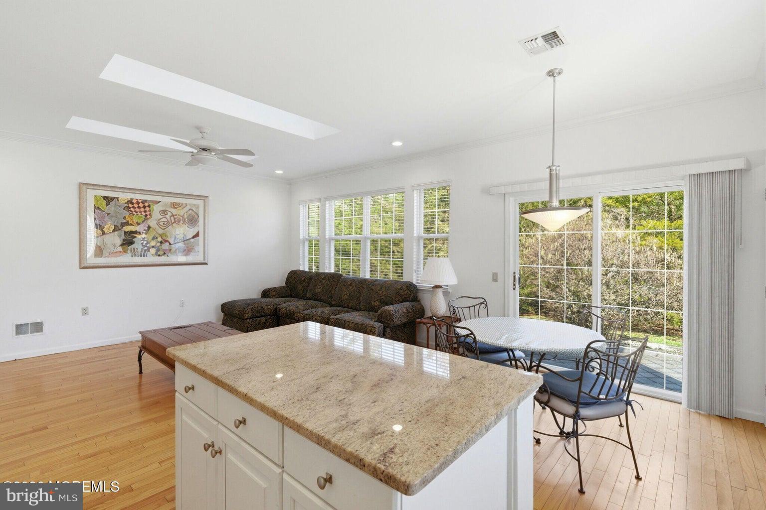11 Ripple Terrace Barnegat, NJ 08005 - Photo 16 of 64 a view of a dining room with furniture window and outside view