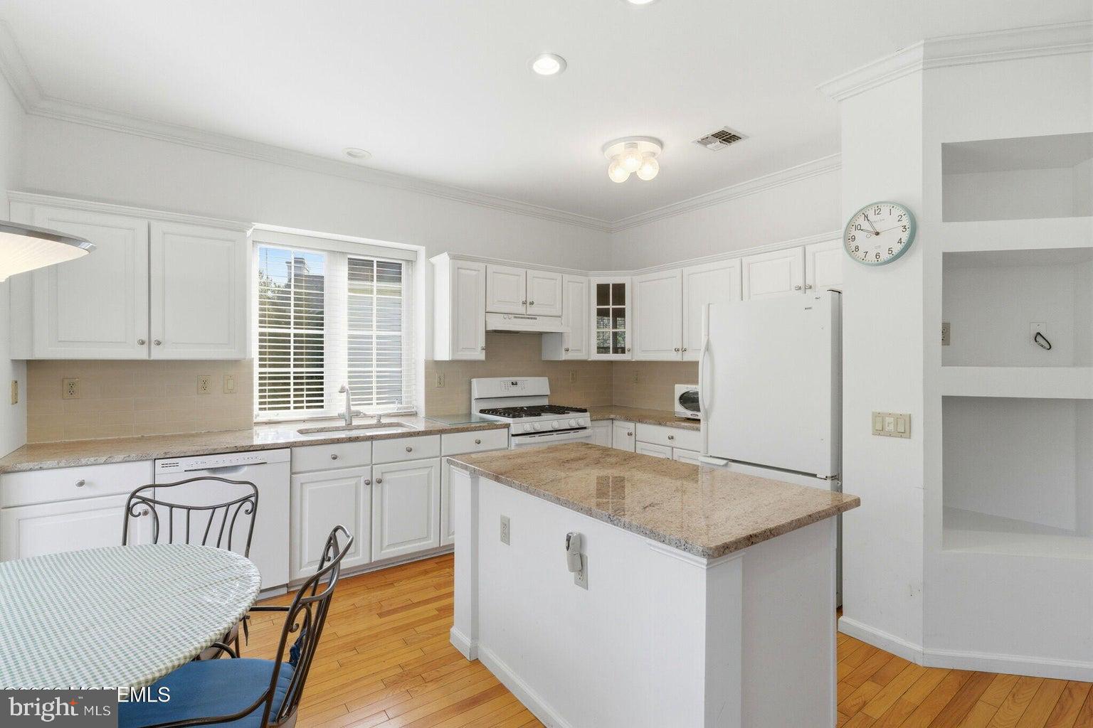 11 Ripple Terrace Barnegat, NJ 08005 - Photo 17 of 64 a kitchen with granite countertop a sink stove and refrigerator