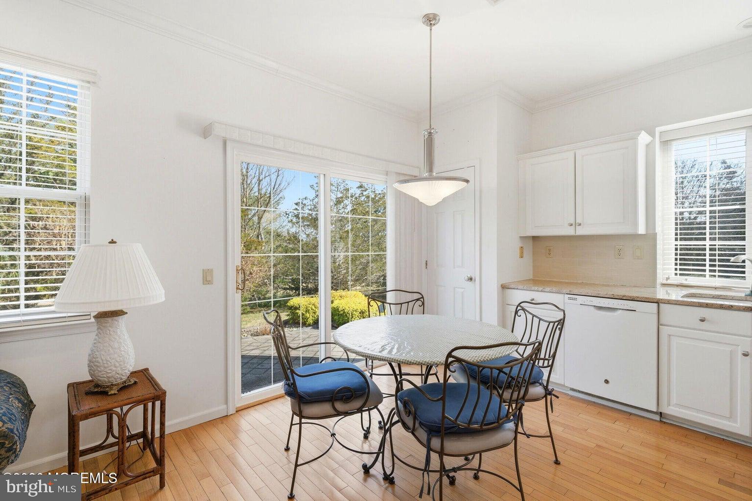 11 Ripple Terrace Barnegat, NJ 08005 - Photo 21 of 64 a view of a dining room with furniture window and wooden floor