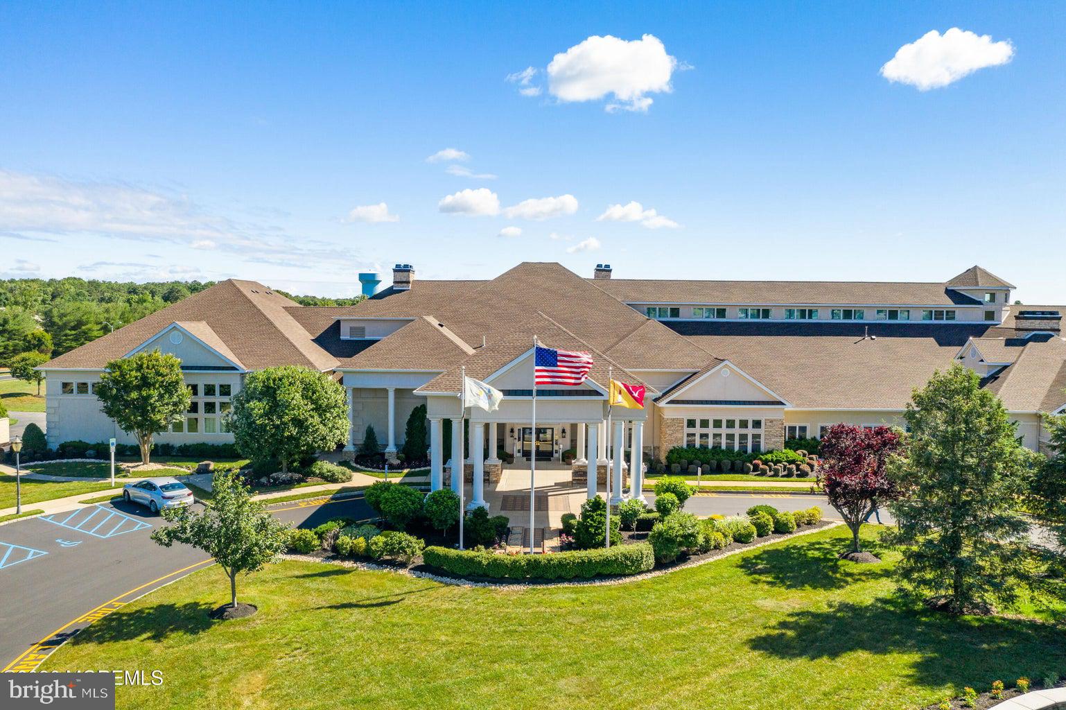 11 Ripple Terrace Barnegat, NJ 08005 - Photo 41 of 64 a front view of house with a garden and swimming pool