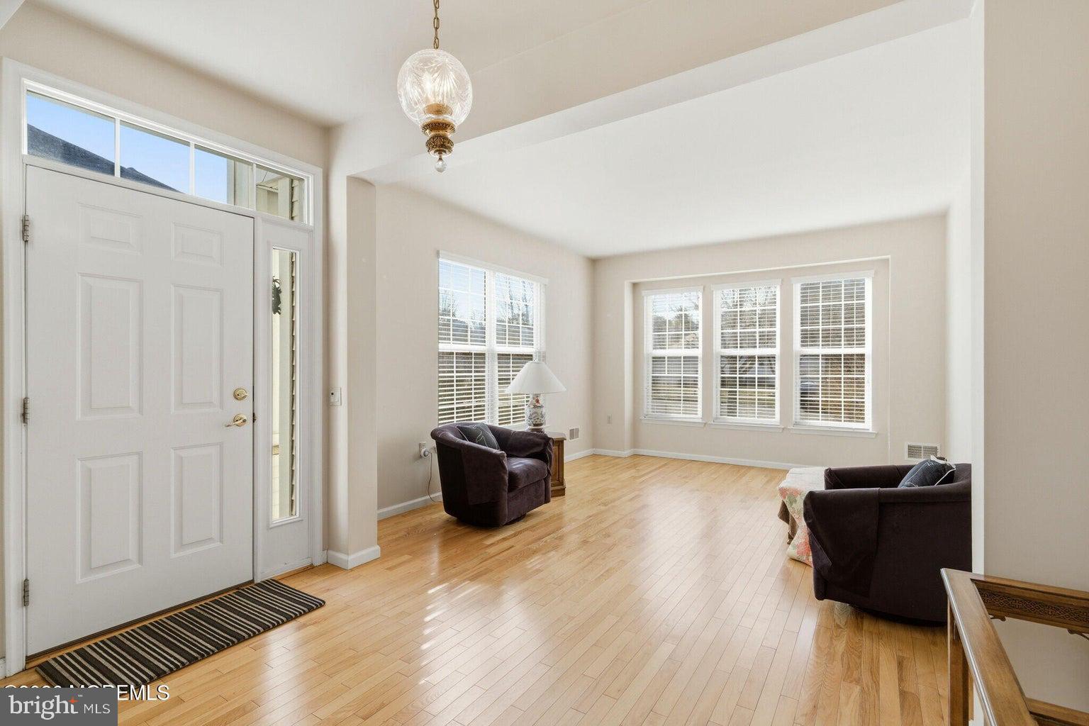 11 Ripple Terrace Barnegat, NJ 08005 - Photo 5 of 64 a view of livingroom with furniture wooden floor and window