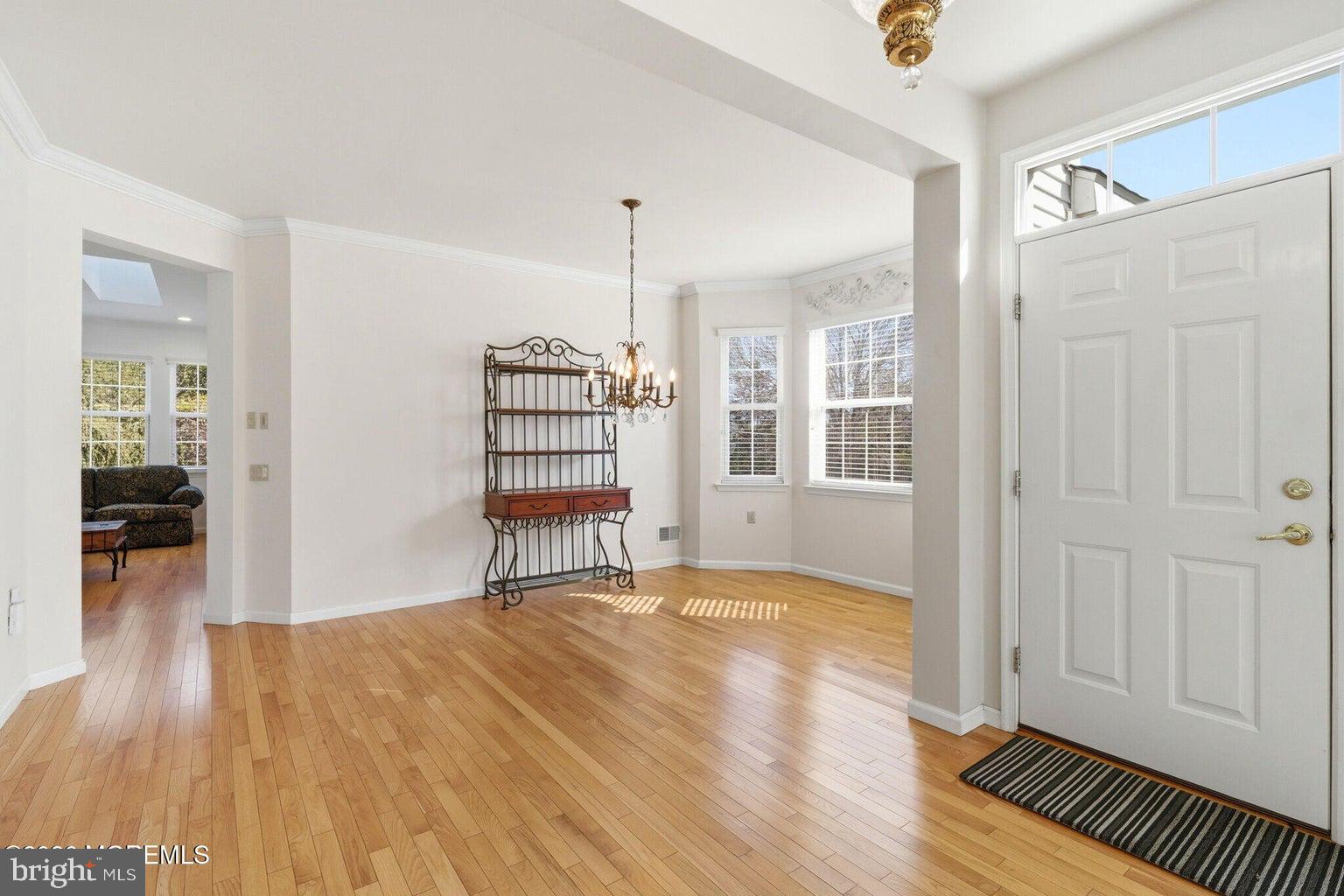 11 Ripple Terrace Barnegat, NJ 08005 - Photo 6 of 64 a view of a room with wooden floor and a window