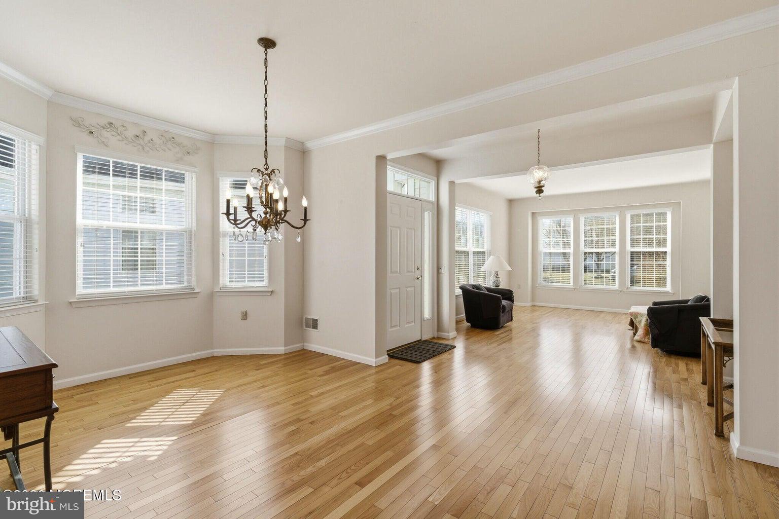 11 Ripple Terrace Barnegat, NJ 08005 - Photo 9 of 64 a view of a room with wooden floor and windows