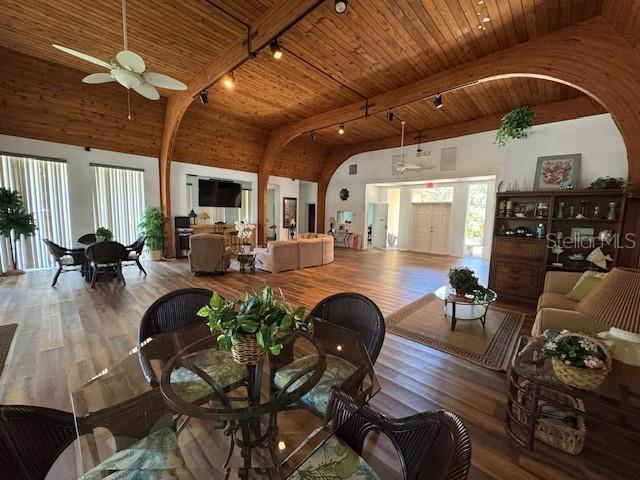 11485 Oakhurst Road, Unit 319 Largo, FL 33774 - Photo 43 of 63 a living room with lots of furniture and gym equipment