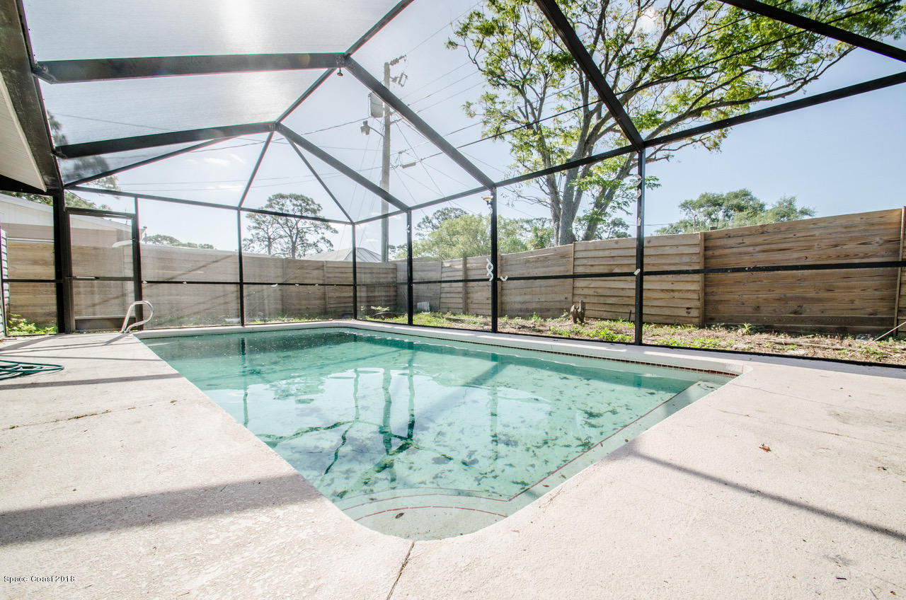 933 Kings Post Road Rockledge, FL 32955 - Photo 13 of 15 933 Kings Post ~ Screened Pool area