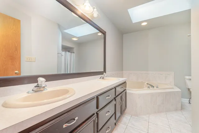 a bathroom with a sink and a bathtub