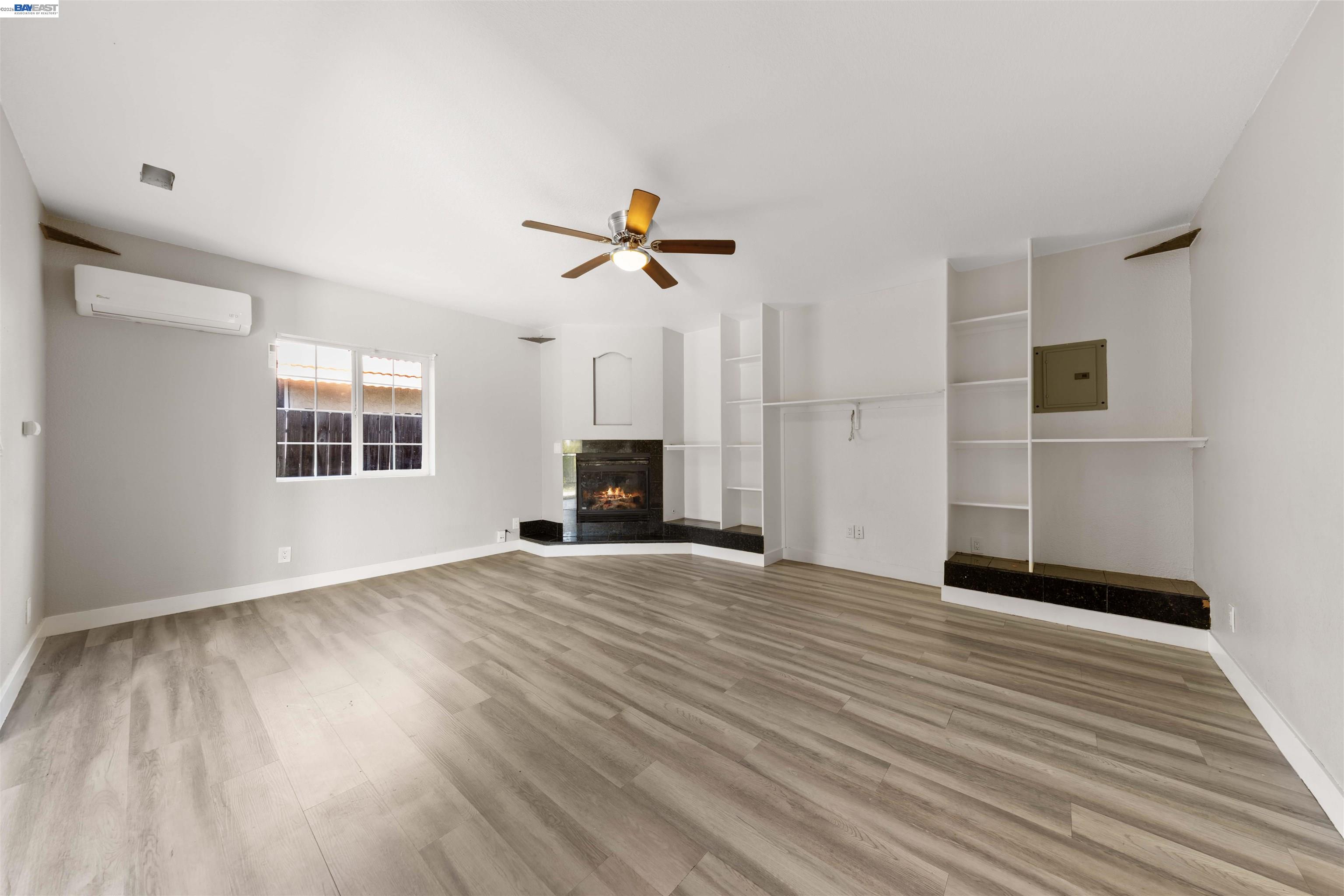 2102 Overhill Road Concord, CA 94520 - Photo 27 of 38 a view of empty room with wooden floor and ceiling fan