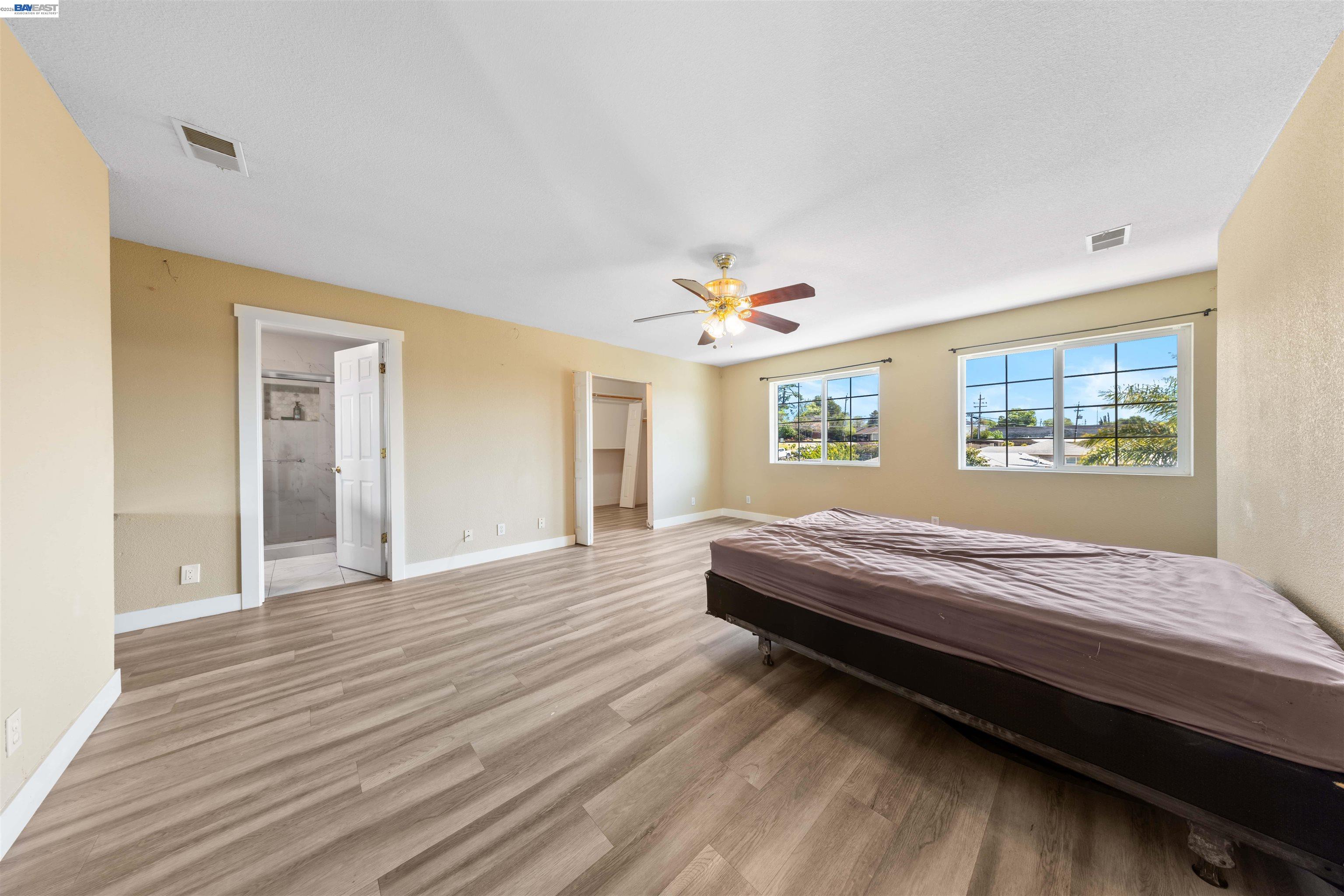 2102 Overhill Road Concord, CA 94520 - Photo 31 of 38 a bedroom with a bed and a window