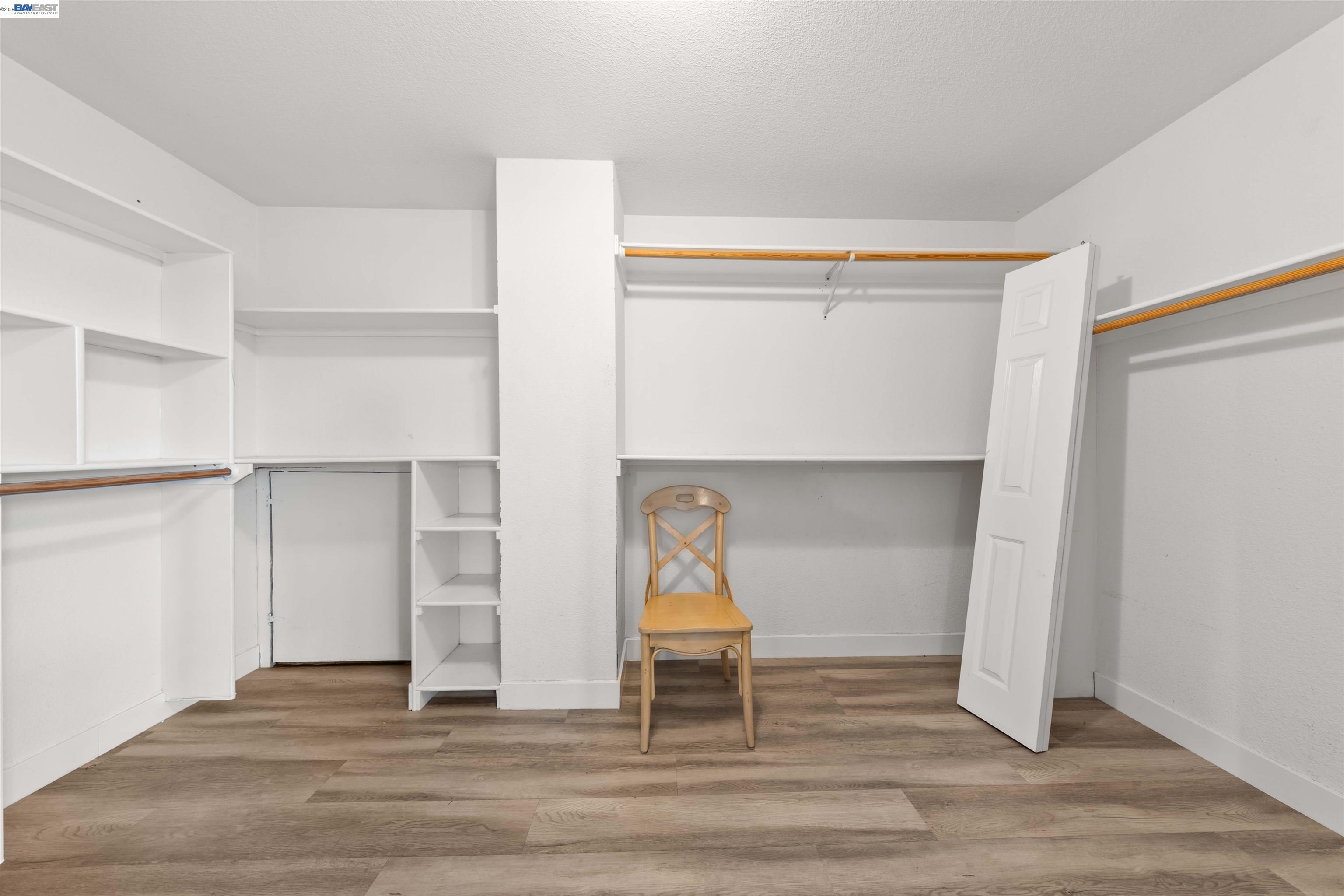 2102 Overhill Road Concord, CA 94520 - Photo 37 of 38 a view of empty room with wooden floor and fan