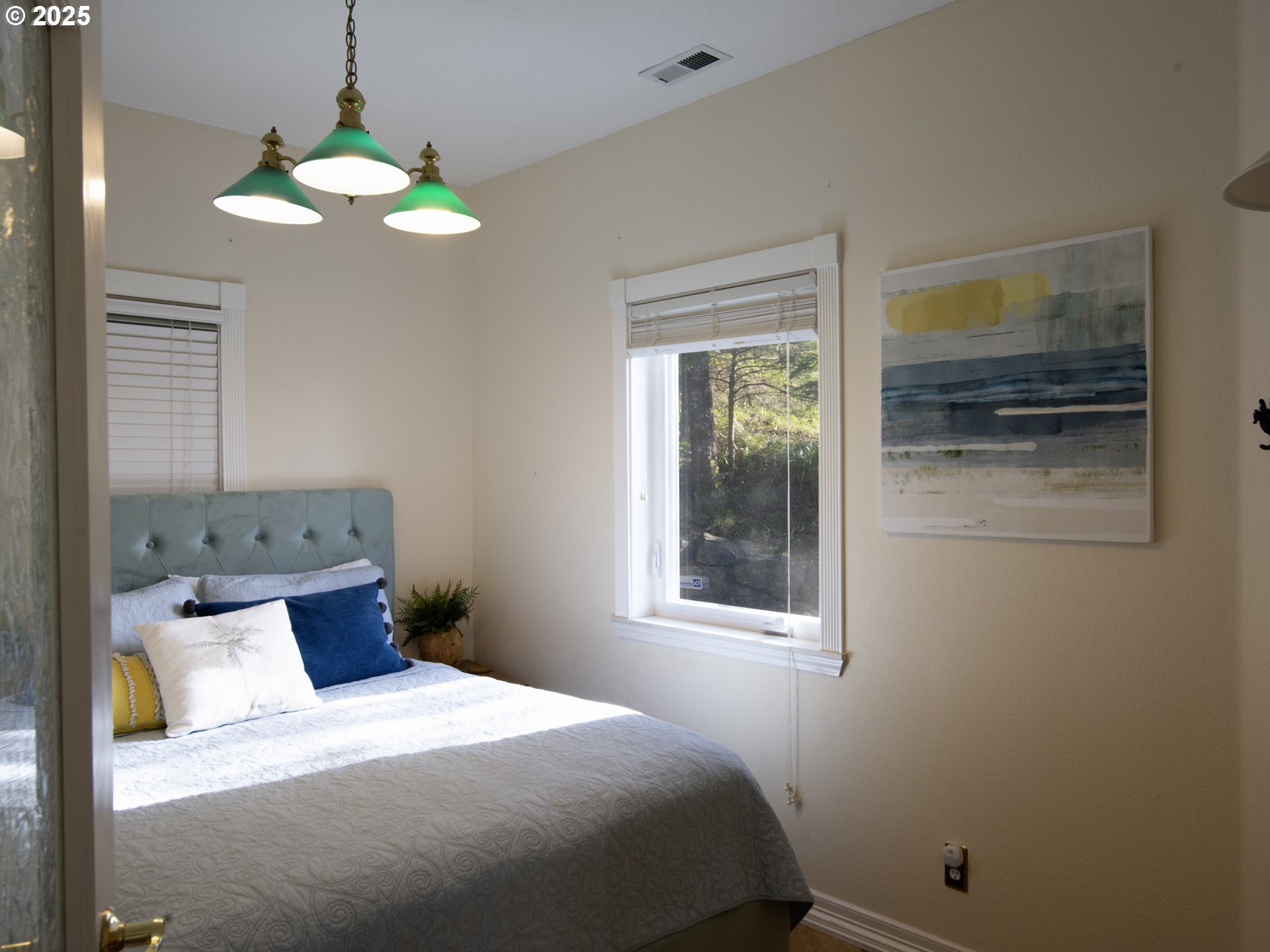 35445 Topping Road Pacific City, OR 97135 - Photo 25 of 37 a bedroom with a bed and a window