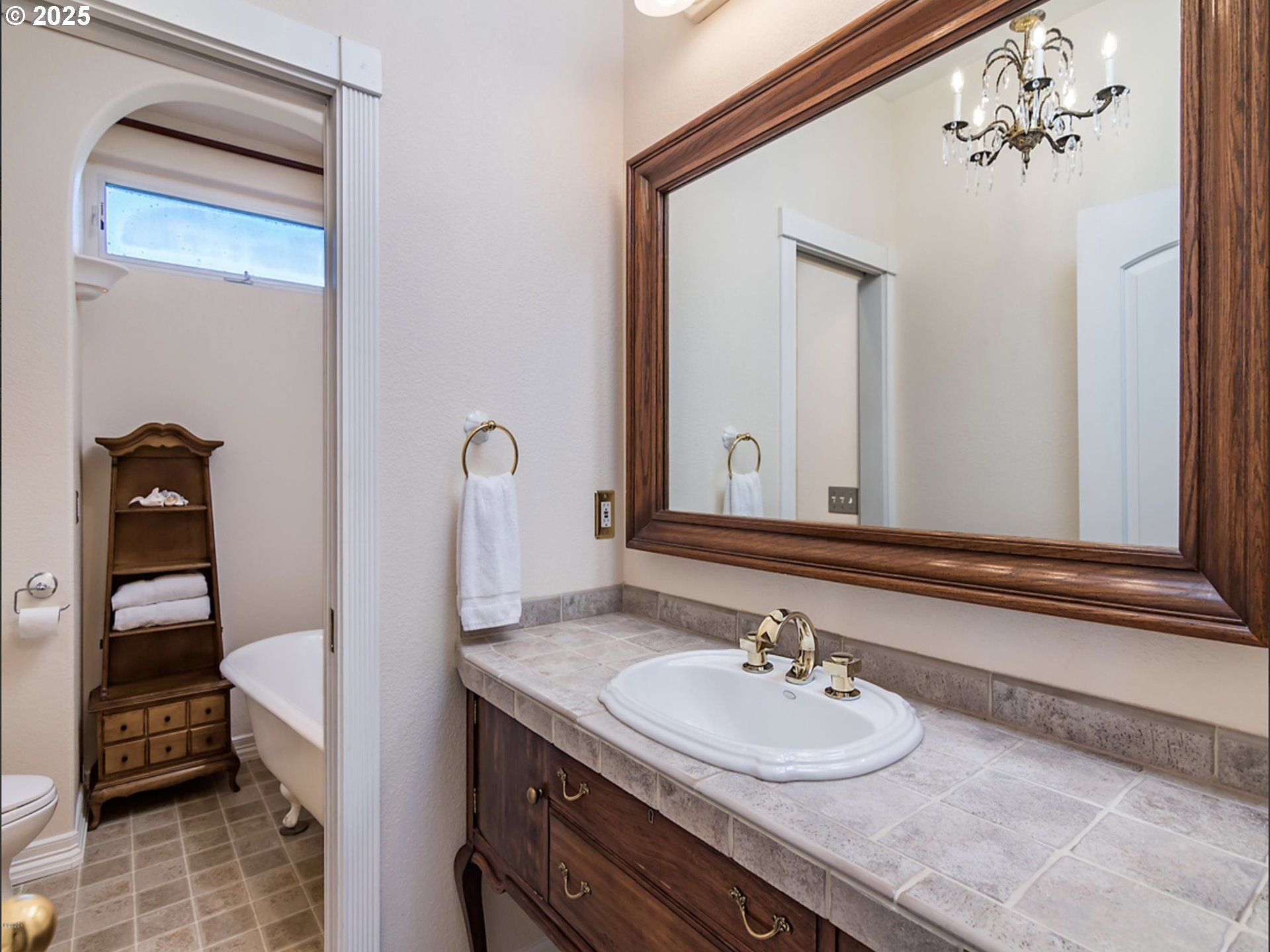 35445 Topping Road Pacific City, OR 97135 - Photo 28 of 37 a bathroom with a sink and a mirror