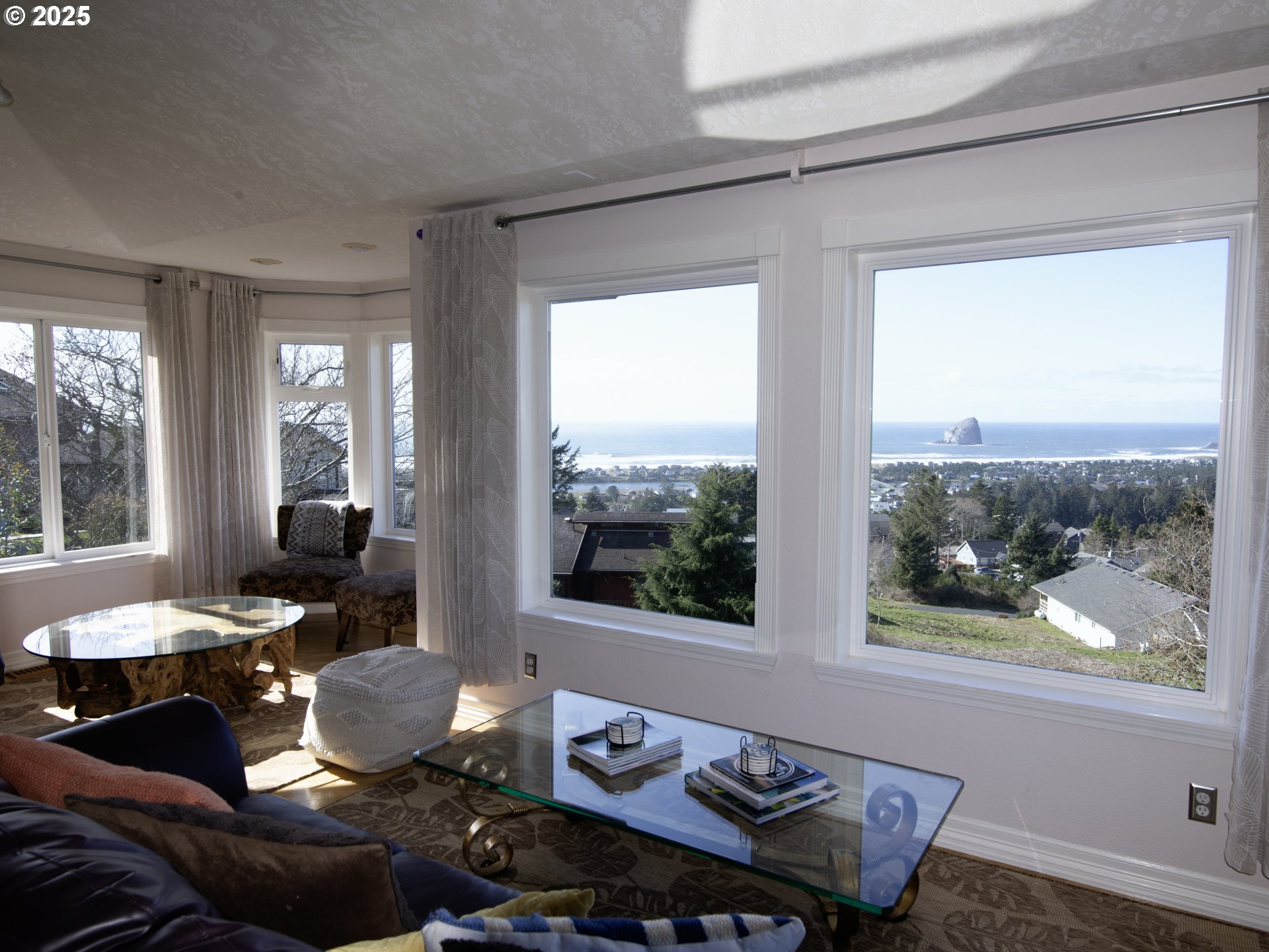 35445 Topping Road Pacific City, OR 97135 - Photo 6 of 37 a living room with furniture and two large window