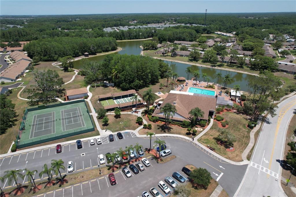 9319 Trowbridge Court New Port Richey, FL 34655 - Photo 77 of 78 an aerial view of a house with a lake view