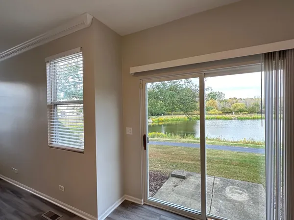 a view of an empty room and window