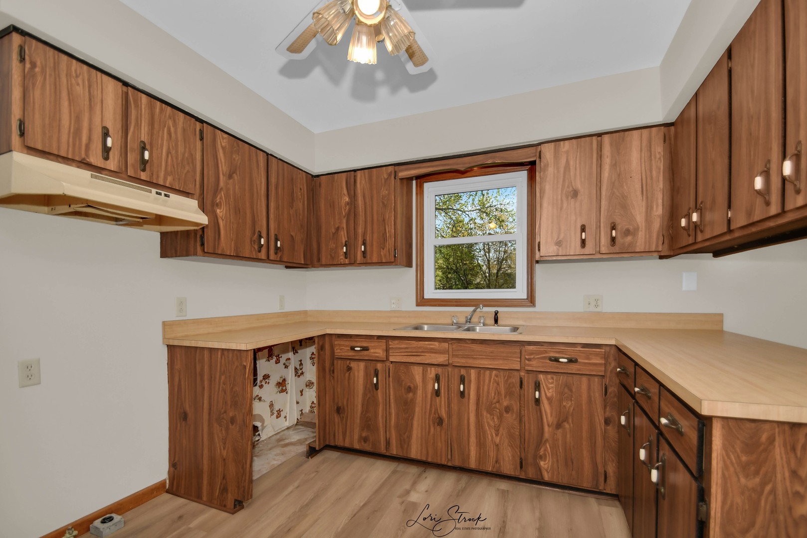869 Heather Drive Bourbonnais, IL 60914 - Photo 14 of 23 a kitchen with a sink cabinets and window