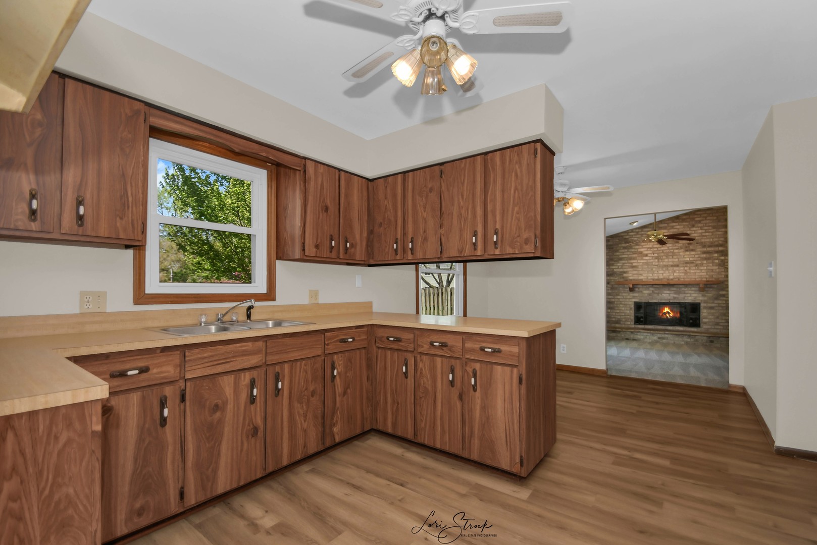869 Heather Drive Bourbonnais, IL 60914 - Photo 15 of 23 a kitchen with wooden cabinets and sink