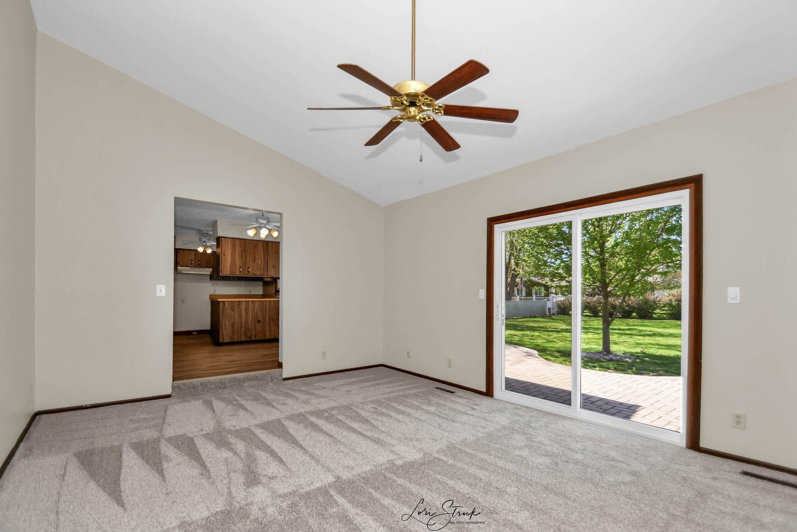 869 Heather Drive Bourbonnais, IL 60914 - Photo 19 of 23 a view of a livingroom with a ceiling fan and window