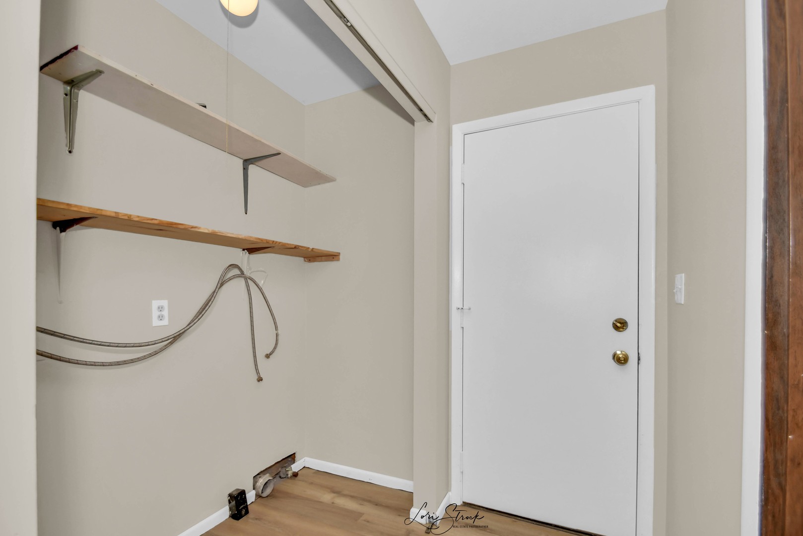 869 Heather Drive Bourbonnais, IL 60914 - Photo 10 of 23 a view of a room with rack on the wall