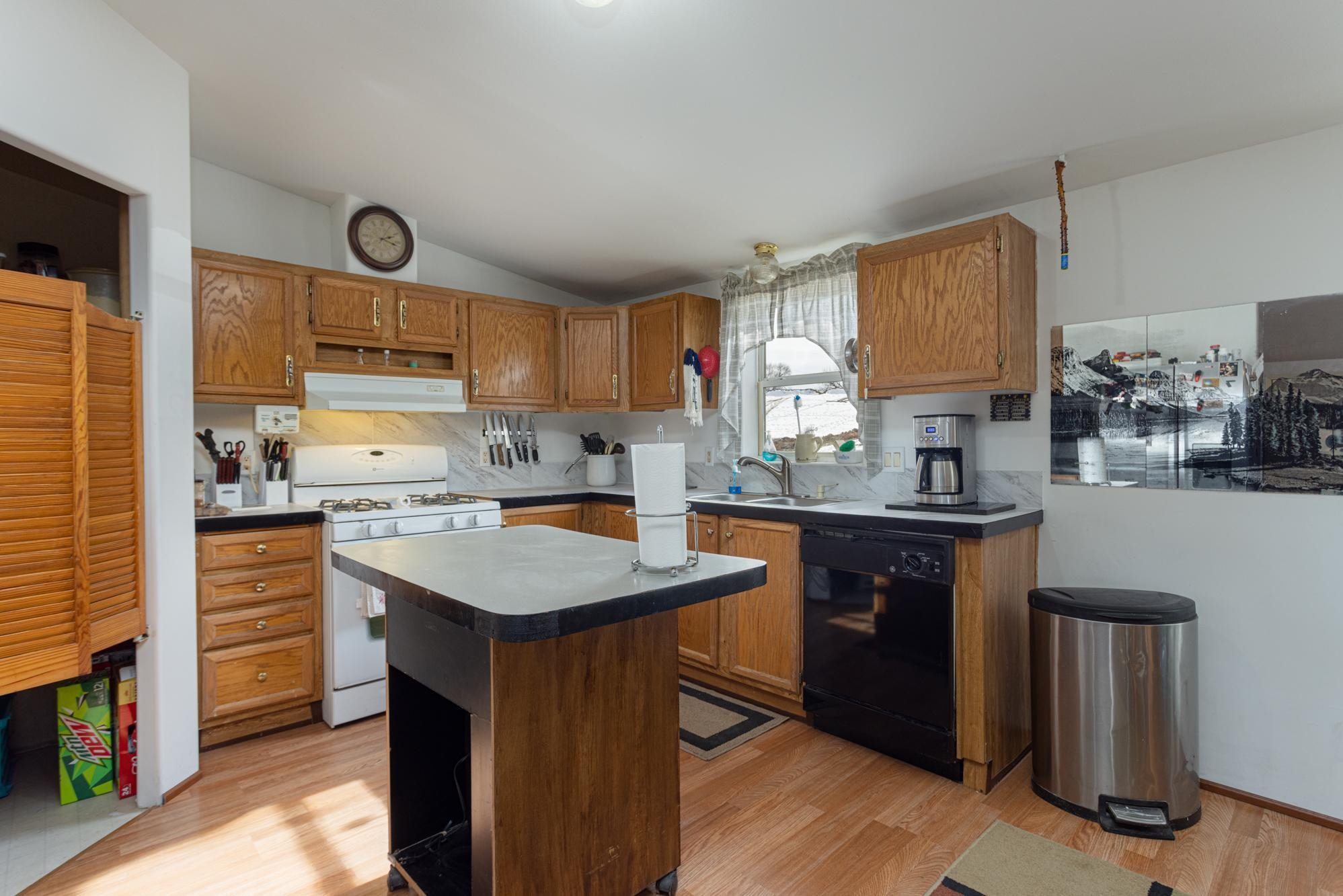 1546 10 Road Mack, CO 81525 - Photo 3 of 34 a kitchen with granite countertop a sink stove and cabinets