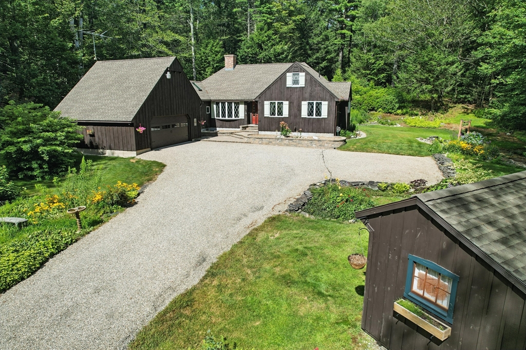 134 Chester Road Blandford, MA 01008 - Photo 29 of 41 a front view of a house with a yard