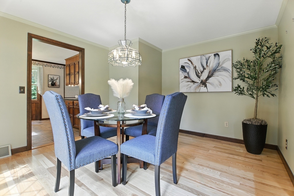 134 Chester Road Blandford, MA 01008 - Photo 4 of 41 a view of a dining room with furniture wooden floor and chandelier