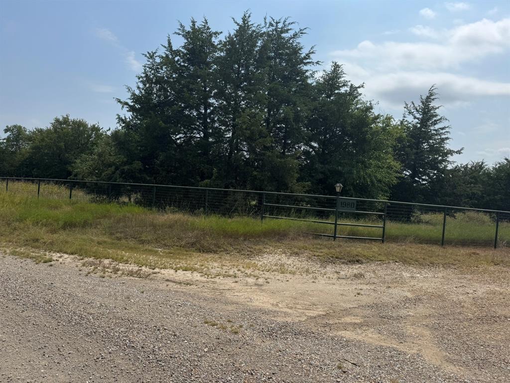 1980 County Road 3040 Bonham, TX 75418 - Photo 20 of 34 a view of a lake with a park