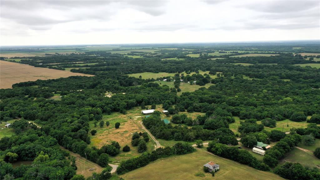 1980 County Road 3040 Bonham, TX 75418 - Photo 24 of 34 an aerial view of city and lake