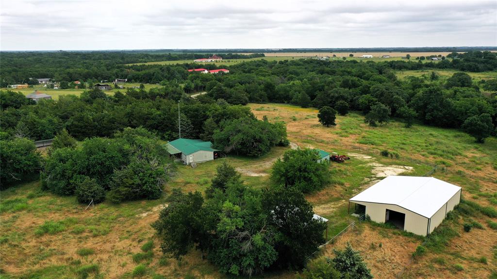 1980 County Road 3040 Bonham, TX 75418 - Photo 32 of 34 an aerial view of a house with yard