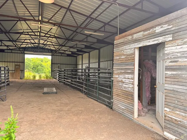 a view of an empty room with a balcony