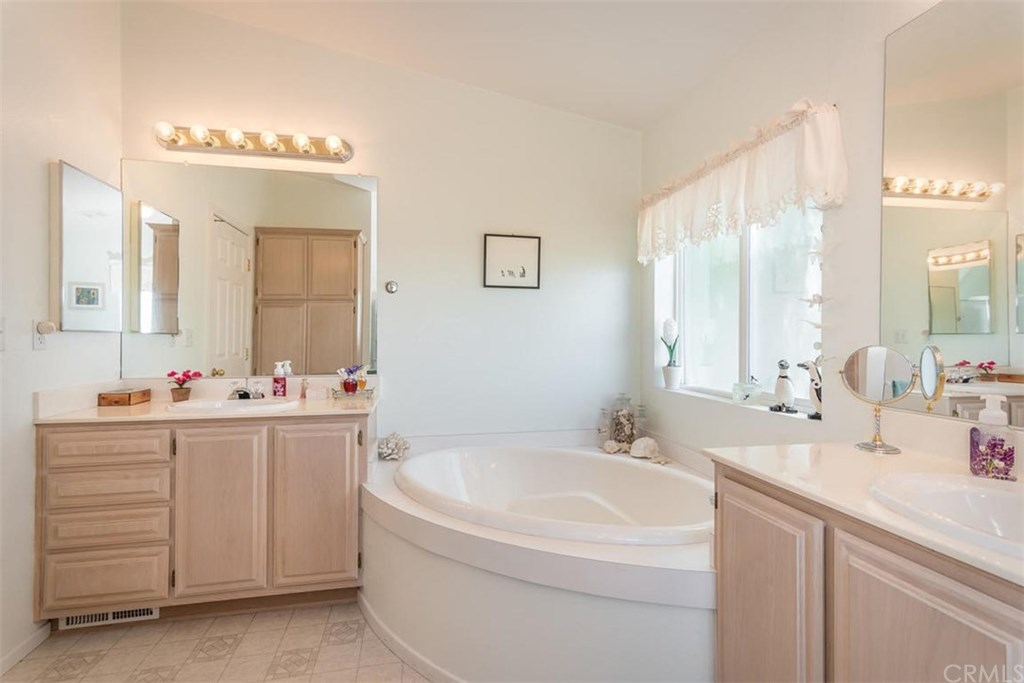 352 Quail Summit Paso Robles, CA 93446 - Photo 17 of 33 a bathroom with a double vanity sink mirror and
