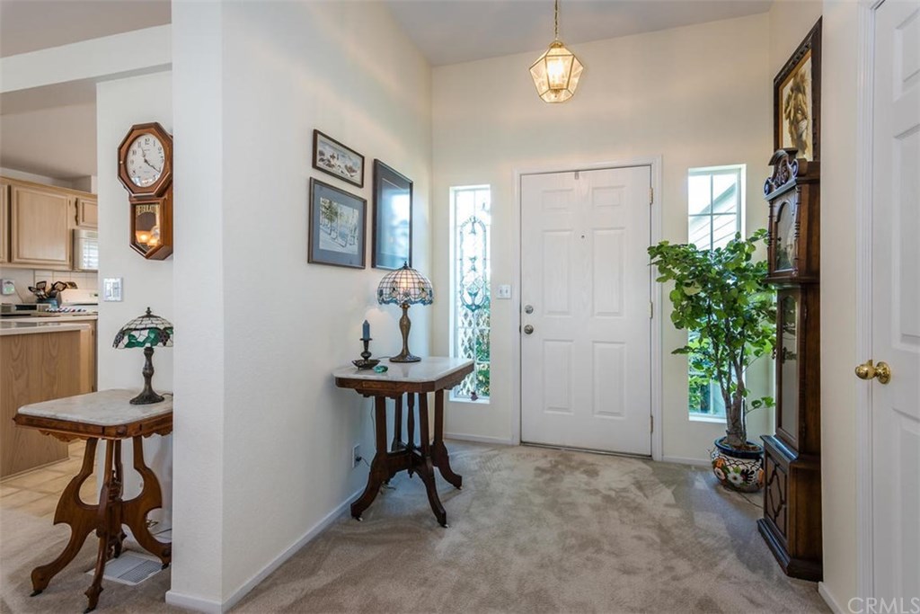 352 Quail Summit Paso Robles, CA 93446 - Photo 3 of 33 a view of a livingroom with furniture and a potted plant