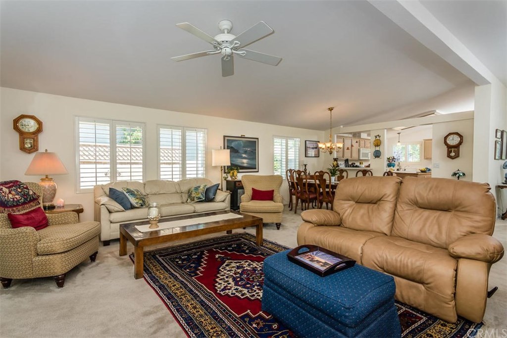 352 Quail Summit Paso Robles, CA 93446 - Photo 5 of 33 a living room with furniture ceiling fan and a rug