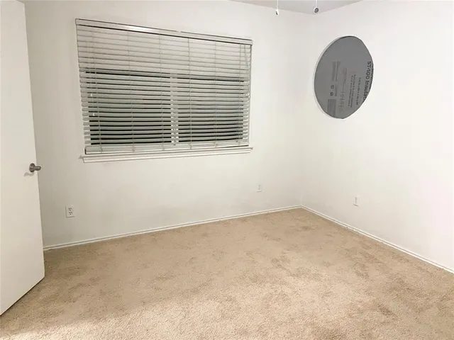 an empty room with window