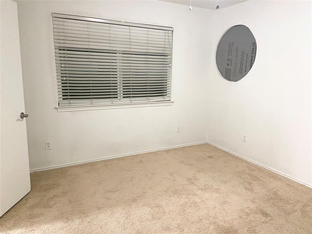 2121 Stone Moss Lane Grapevine, TX 76051 - Photo 14 of 17 an empty room with window