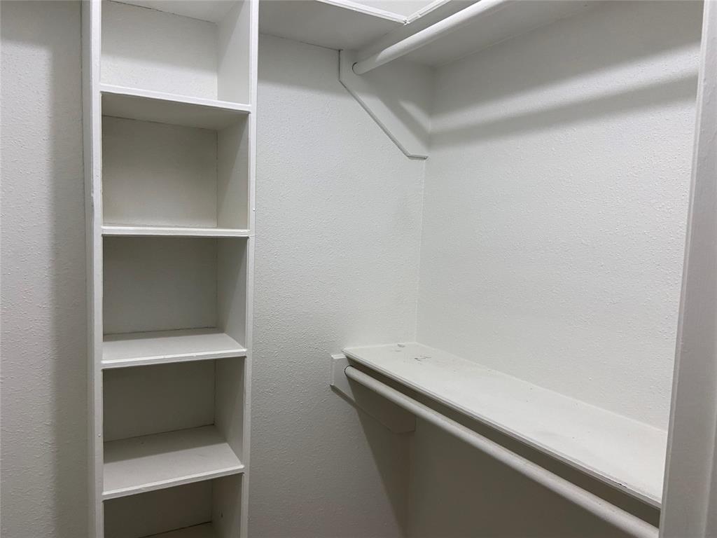 2121 Stone Moss Lane Grapevine, TX 76051 - Photo 17 of 17 a hallway with storage